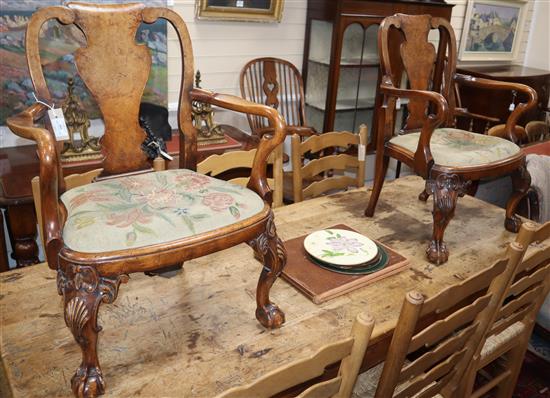 A pair of 1920s George I design walnut childs chairs